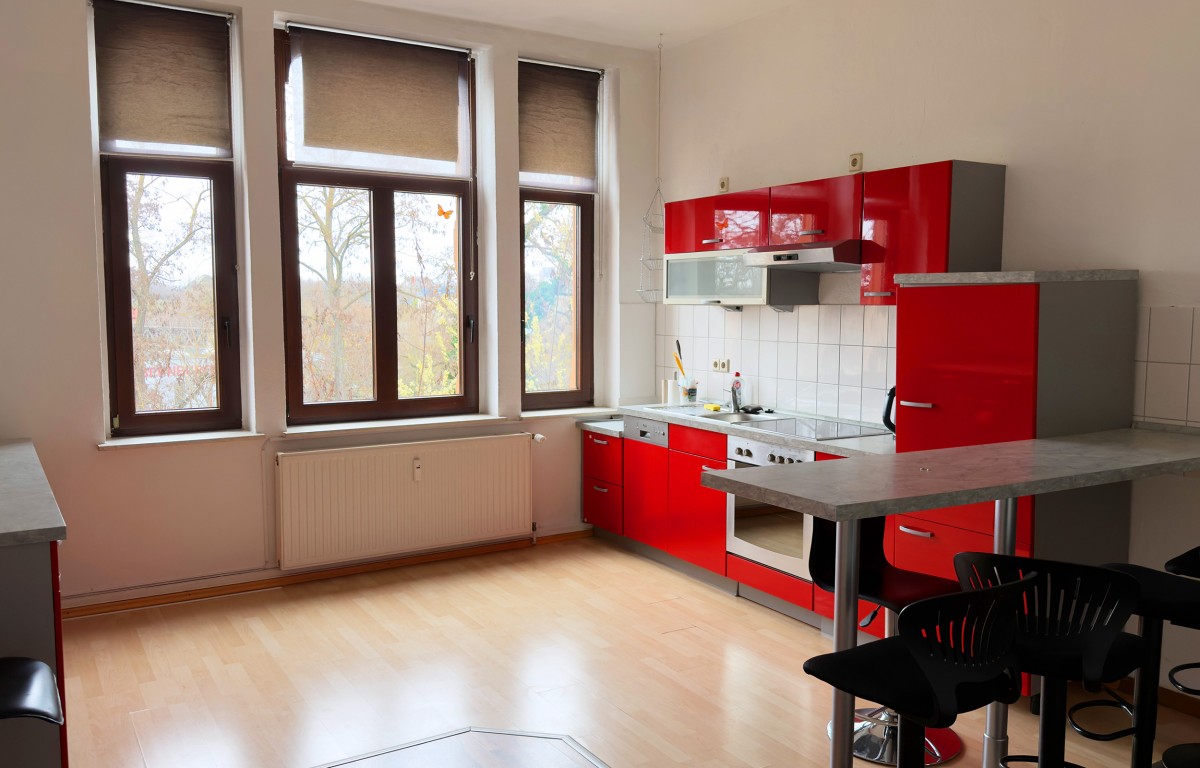 Charmante 1-Zimmer-Wohnung mit Einbauküche und Gemeinschaftsgarten - Foto 1