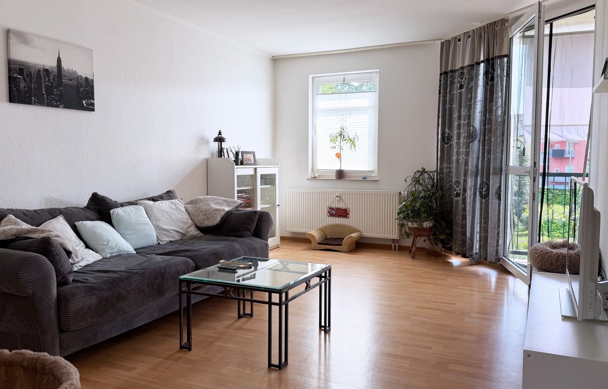 Gemütliche Wohnung mit Balkon und Garagenstellplatz - Foto 1