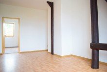 WE6 Wohnzimmer Kapitalanlage mit Zukunft - vollvermietetes Mehrfamilienhaus mit sieben Wohneinheiten