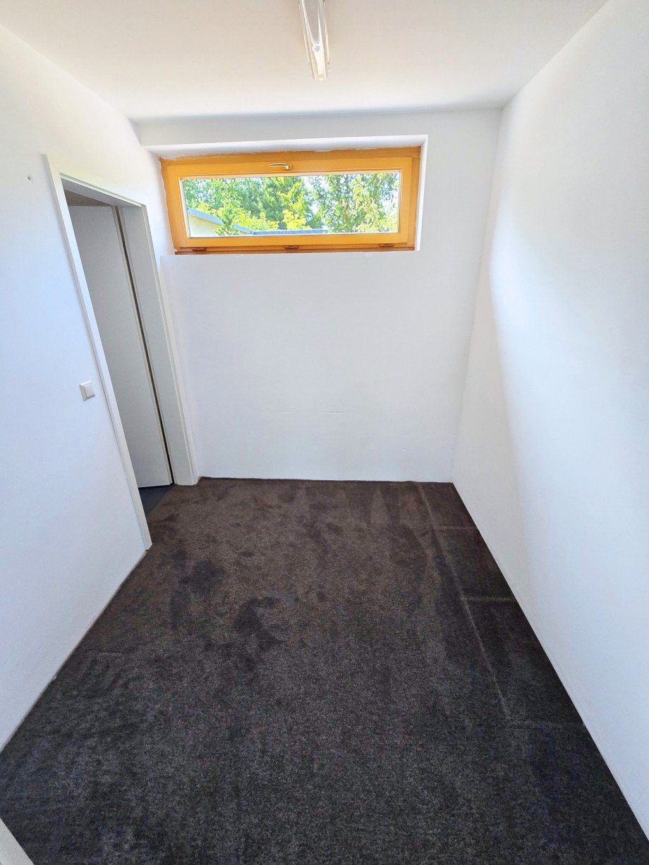 Durchgangszimmer_B�ro Einfamilienhaus Gr�bzig