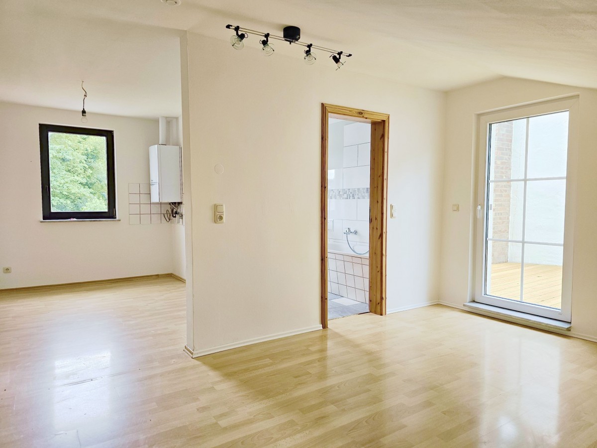 Eine Terrasse und 1,5 individuelle Zimmer warten auf Sie! - Foto 4