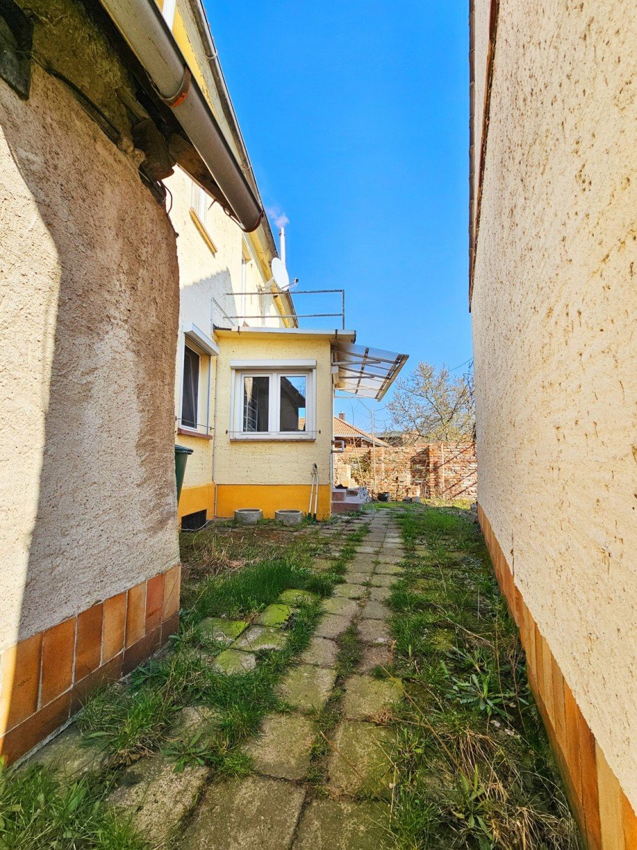 Durchgang zum Haus Einfamilienhaus Gro�badegast