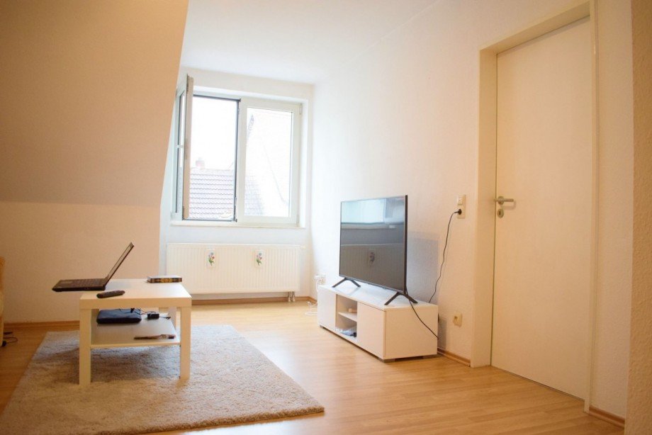 Wohnzimmer Dachgeschosswohnung K�then (Anhalt)